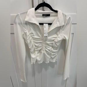 NWT. Urban Outfitters Long Sleeve Cropped Top size Medium